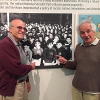 Pete and his former classmate Fred, pointing to themselves in a photo in 1941. June 2016.
