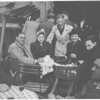 Carla's family with soldiers in the foreground, 1940.