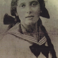 Noémi's Mother Juliska Schonberger as a teen wearing earrings that she gave to Noemi.