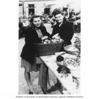 Ann (right) and Stepka at her stand in the Public Market, Krakow, prior to pogrom which forced them into a DP Camp, August 11, 1945.