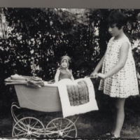 Irene with her baby doll in a stroller at Wisnowa Gora, 1929-1930