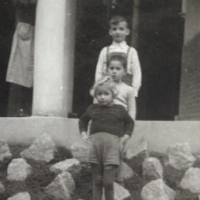 Tom (middle) playing with friends, 1940