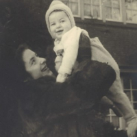 Ada holding daughter Ine-Marie up in the air in 1949.